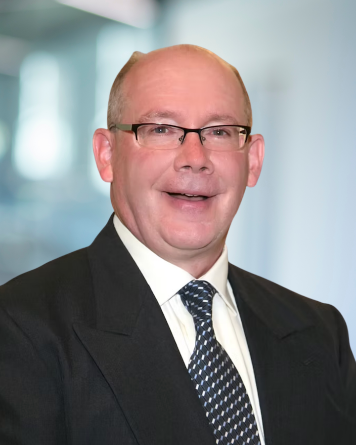 Rob Beacom, Director of Architecture at KC Engineering, smiling in professional attire, showcasing expertise in architectural design and BIM standards.